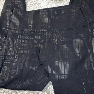 Black, Lululemon manifesto, shiny leggings